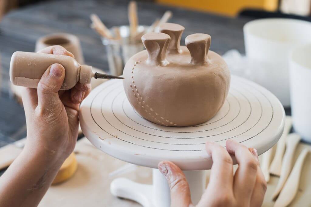 The Detail Process Of Decorating The Clay Vase At Pottery Studio